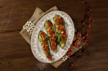 Baked zucchini with millet filling