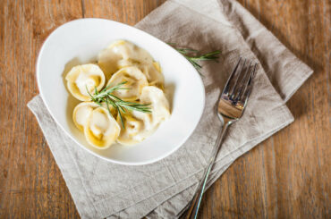 Homemade tortellini with mushroom and ricotta filling