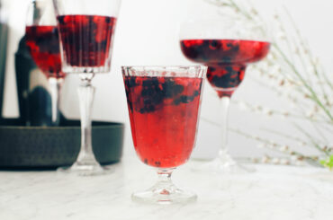 Refreshing prosecco creation with red berries