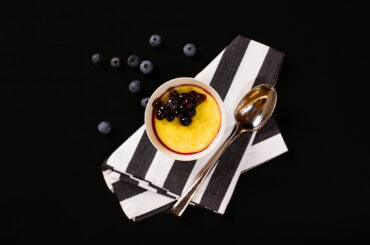 Soy vanilla pudding with blueberry sauce