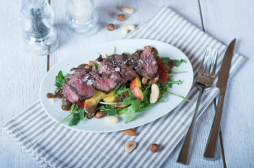 Summer salad with steak and nectarine