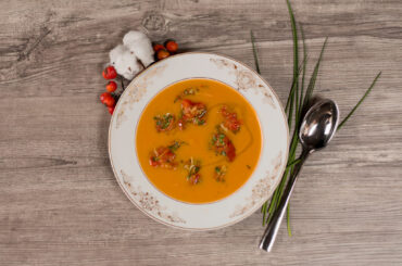 Sweet potato soup with chili tomatoes