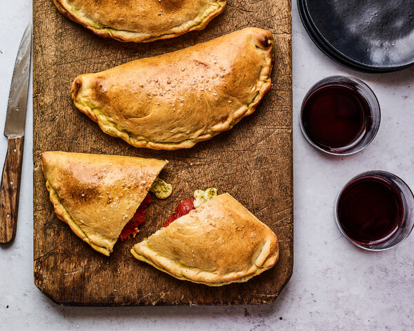 Roasted Tomato, Mozzarella and Pesto Calzones