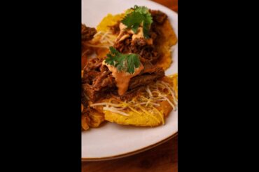 Shredded Beef & Cheese Topped Tostones