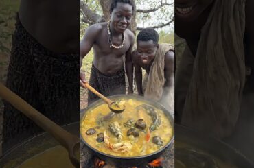 Hadzabe Cooking and Eating Together by the Fire #Hadzabe #TribalLife #WildFood#Cooking #shorts #food