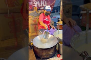 Crispy Southern Thai Khanom La, Freshly made at A Lively Bangkok Festival