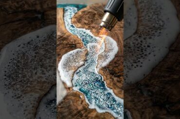 Large sea shaped epoxy resin table for dining