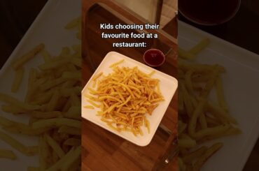 Kids Choosing Their Favourite Food At A Restaurant.