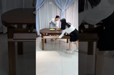 #this is shows a round Sheesham wood dining table set featuring a built-in rotating Lazy Susan