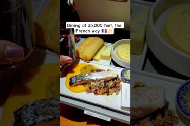 Fine dining… but make it in the sky. #AirFrance #BusinessClass #LuxuryTravel #InFlightDining