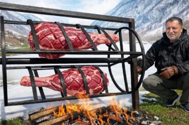 Roasting Two GIANT Juicy Beef Legs On A Rotating Grill!