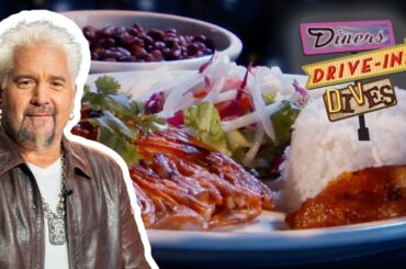 Guy Devours Roast Pork at Cuban Family-Style Restaurant | Diners, Drive-Ins and Dives | Food Network