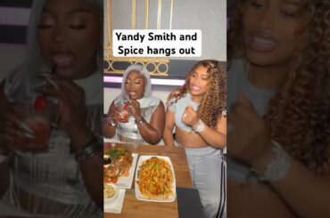 Yandy Smith with Spice at her restaurant
