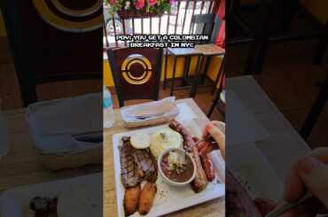 pov colombian breakfast in nyc #nyc #foodie #colombianfood #bandejapaisa #sunsetpark #citylife #food