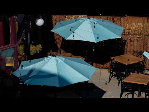 Woman killed by patio umbrella while dining at lakeside South Carolina restaurant: Coroner Woman killed by patio umbrella while dining at lakeside South Carolina restaurant: Coroner