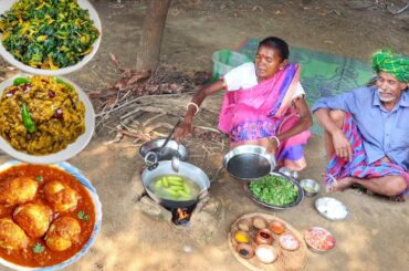 EGG CURRY, POTOL VORTA & KOLMI SHAK VAJI cooking for eating lunch by santali tribe old couple