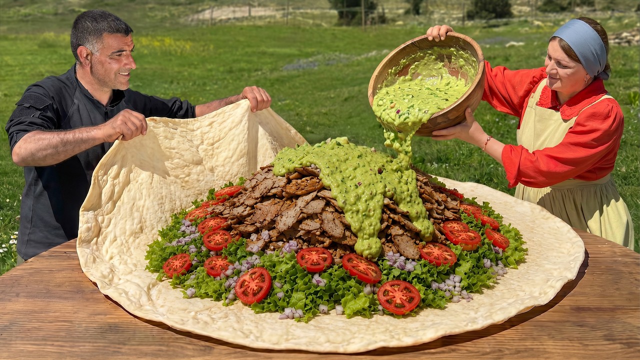 Giant Shawarma Burrito Cooked On A Custom Log Grill For A Village Feast! Giant Shawarma Burrito Cooked On A Custom Log Grill For A Village Feast!