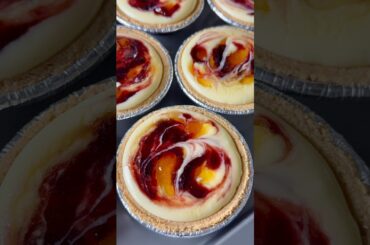 Mini Peach Raspberry Swirl Cheesecakes