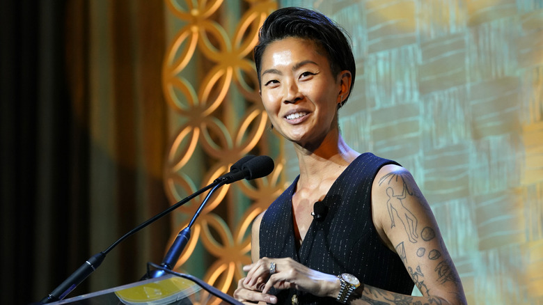 Kristen Kish speaking at an awards ceremony