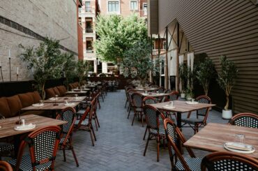 A viral NYC chef just opened a Greek gastrobar in Lincoln Park featuring a 2,400-square-foot olive tree patio