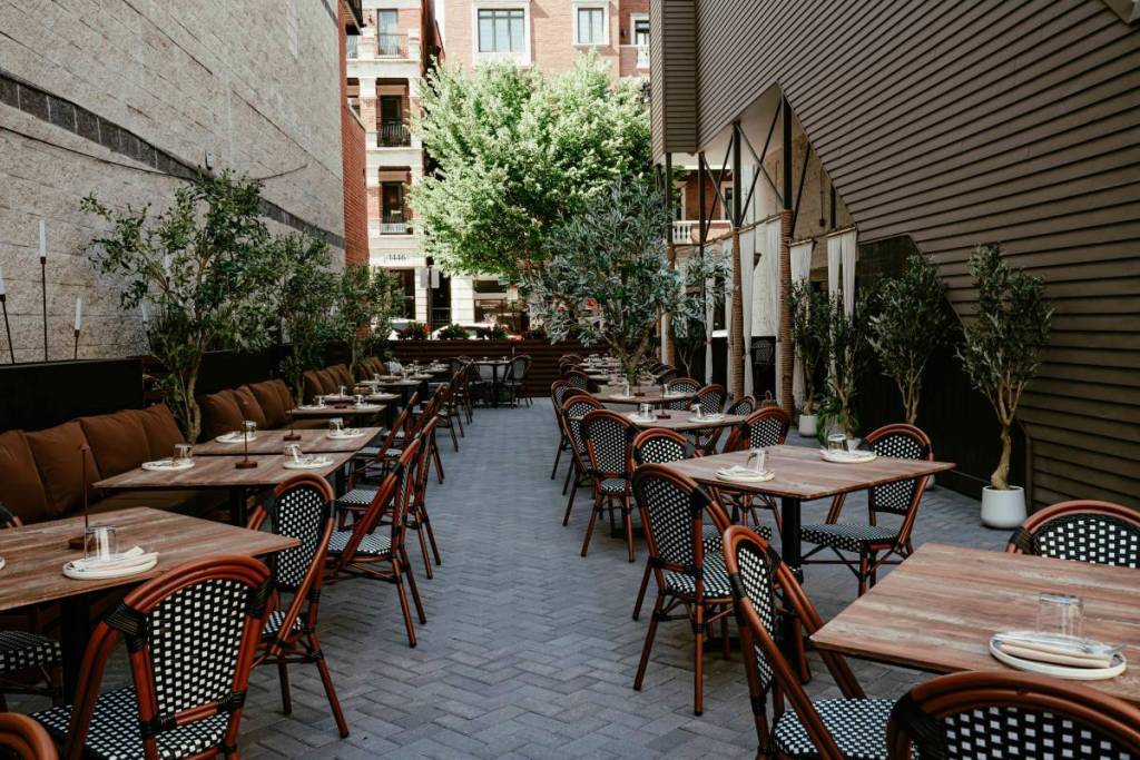 A viral NYC chef just opened a Greek gastrobar in Lincoln Park featuring a 2,400-square-foot olive tree patio
